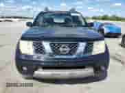 2006 Nissan Frontier SE with VIN 1N6AD07UX6C412495, listed as a Copart auction lot 84879235 with 257,704 mi miles and Salvage title. Bid and sale history available at DreamBid. Image 5.