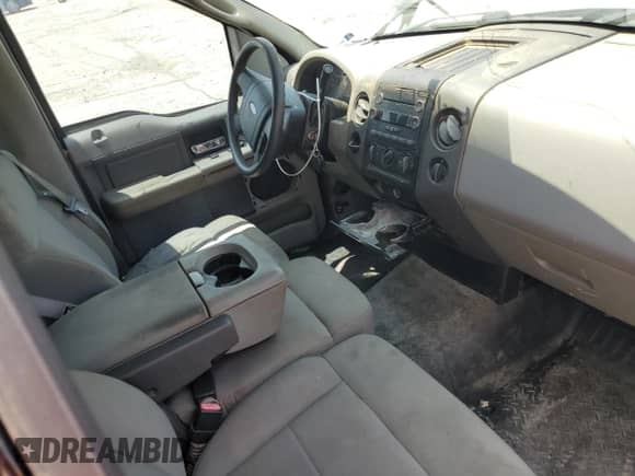 2008 Ford F-150 XL с VIN 1FTRF12W98KD27199, выставлен на аукционе Copart как лот 67636975 с пробегом 189 877 миль миль и Списание • Salvage title. История ставок и продаж доступна на DreamBid. Изображение 8.