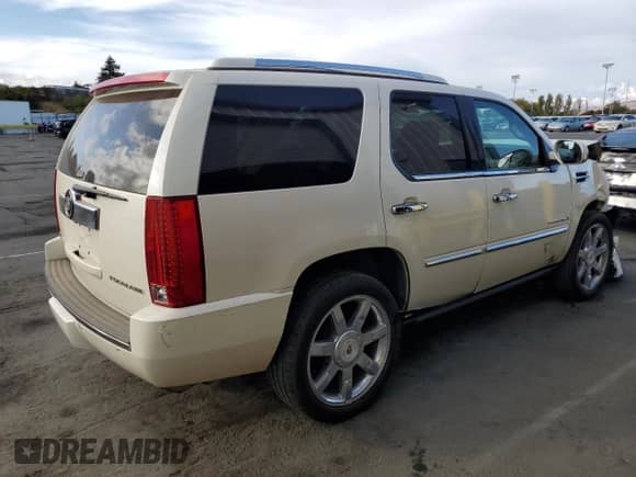 2009 Cadillac Escalade with VIN 1GYFK23279R222454, listed as a Copart auction lot 71914165 with 128,555 mi miles and Salvage title. Bid and sale history available at DreamBid. Image 3.
