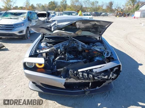2018 Dodge Challenger R/T Scat Pack with VIN 2C3CDZFJ2JH300887, listed as a IAAI auction lot 43447415 with 83,601 mi miles and . Bid and sale history available at DreamBid. Image 6.