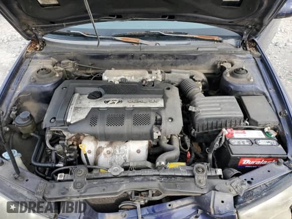 2003 Hyundai Elantra GT z VIN KMHDN55D03U078377, wystawiony jako Copart lot #51100395 z przebiegiem 192 766 mil mil oraz Szkoda całkowita • Salvage title. Historia ofert i sprzedaży dostępna na DreamBid. Obrazek 12.