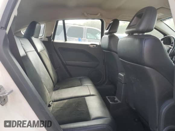 2008 Dodge Caliber SXT with VIN 1B3HB48C48D590860, listed as a Copart auction lot 54125585 with 242,177 mi miles and Salvage title. Bid and sale history available at DreamBid. Image 11.