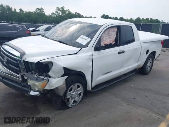 2012 Toyota Tundra z VIN 5TFRU5F17CX027958, wystawiony jako IAAI lot #42690061 z przebiegiem 228 438 mil mil oraz . Historia ofert i sprzedaży dostępna na DreamBid. Obrazek 2.