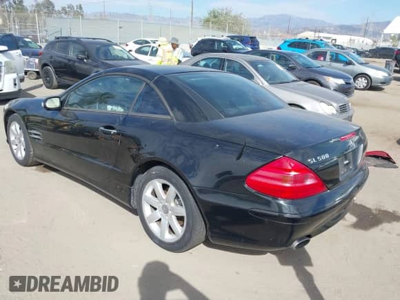 2003 Mercedes-Benz SL 500 z VIN WDBSK75F53F059151, wystawiony jako IAAI lot #43357428 z przebiegiem 106 245 mil mil oraz . Historia ofert i sprzedaży dostępna na DreamBid. Obrazek 3.