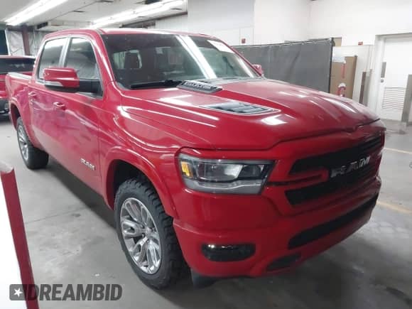 2022 Ram 1500 Laramie z VIN 1C6SRFJM5NN281393, wystawiony jako IAAI lot #43254075 z przebiegiem 55 002 mil mil oraz . Historia ofert i sprzedaży dostępna na DreamBid. Obrazek 1.