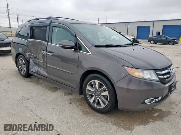 2015 Honda Odyssey Touring Elite с VIN 5FNRL5H96FB082857, выставлен на аукционе Copart как лот 59637105 с пробегом 187 947 миль миль и Списание • Salvage title. История ставок и продаж доступна на DreamBid. Изображение 4.
