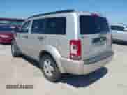 2009 Dodge Nitro SE z VIN 1D8GT28K99W513413, wystawiony jako IAAI lot #39462494 z przebiegiem 196 456 mil mil oraz . Historia ofert i sprzedaży dostępna na DreamBid. Obrazek 3.