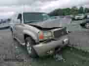 2000 Cadillac Escalade z VIN 1GYEK13R5YR112858, wystawiony jako Copart lot #71651294 z przebiegiem 228 689 mil mil oraz Szkoda całkowita • Salvage title. Historia ofert i sprzedaży dostępna na DreamBid. Obrazek 11.