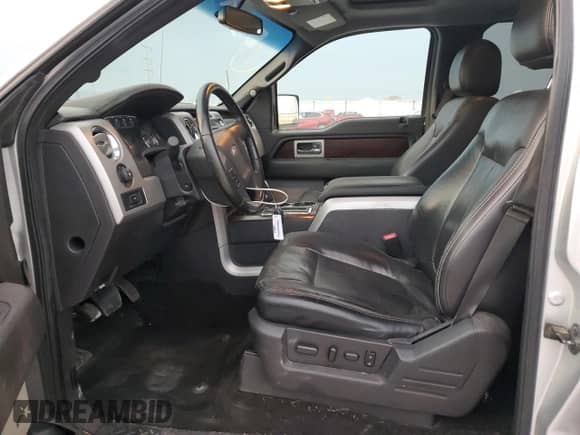 2012 Ford F-150 Lariat with VIN 1FTFW1ET0CFB34252, listed as a Copart auction lot 82726885 with 210,606 mi miles and Salvage title. Bid and sale history available at DreamBid. Image 7.