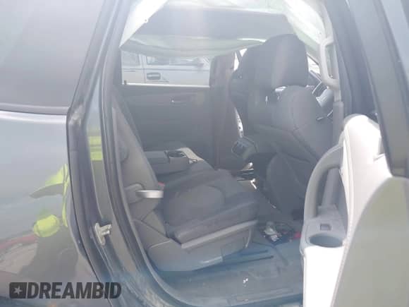 2014 Chevrolet Traverse LS z VIN 1GNKVFED8EJ309426, wystawiony jako IAAI lot #42571126 z przebiegiem 225 400 mil mil oraz . Historia ofert i sprzedaży dostępna na DreamBid. Obrazek 8.