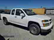 2009 Chevrolet Colorado Work Truck with VIN 1GCCS19E098134436, listed as a Copart auction lot 49549805 with 229,391 mi miles and Salvage title. Bid and sale history available at DreamBid. Image 4.