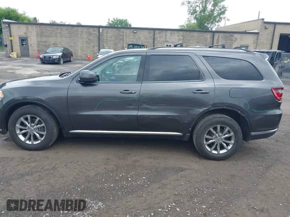 2018 Dodge Durango SXT with VIN 1C4RDJAG1JC172857, listed as a IAAI auction lot 42631205 with 93,941 mi miles and . Bid and sale history available at DreamBid. Image 14.