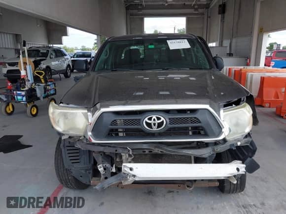 2014 Toyota Tacoma PreRunner z VIN 5TFJX4GN1EX033709, wystawiony jako IAAI lot #42138812 z przebiegiem 168 561 mil mil oraz . Historia ofert i sprzedaży dostępna na DreamBid. Obrazek 13.