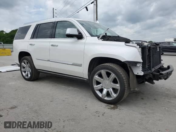 2020 Cadillac Escalade Premium Luxury with VIN 1GYS4CKJ2LR307619, listed as a Copart auction lot 54815335 with 46,312 mi miles and Salvage title. Bid and sale history available at DreamBid. Image 4.