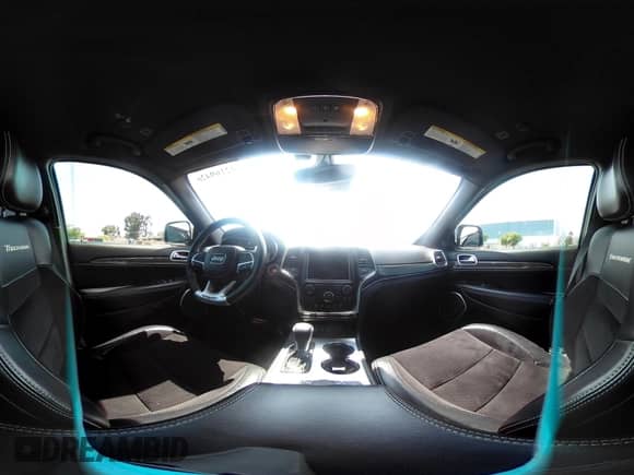 2018 Jeep Grand Cherokee Trackhawk with VIN 1C4RJFN97JC199045, listed as a IAAI auction lot 42169426 with 17,140 mi miles and . Bid and sale history available at DreamBid. Image 18.