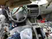 1998 Chevrolet Blazer LS with VIN 1GNCS13WXW2135178, listed as a Copart auction lot 60101125 with Not provided miles and Salvage title. Bid and sale history available at DreamBid. Image 8.