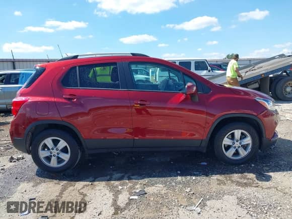 2021 Chevrolet Trax LT z VIN KL7CJLSB4MB314557, wystawiony jako IAAI lot #42377756 z przebiegiem 33 976 mil mil oraz . Historia ofert i sprzedaży dostępna na DreamBid. Obrazek 13.