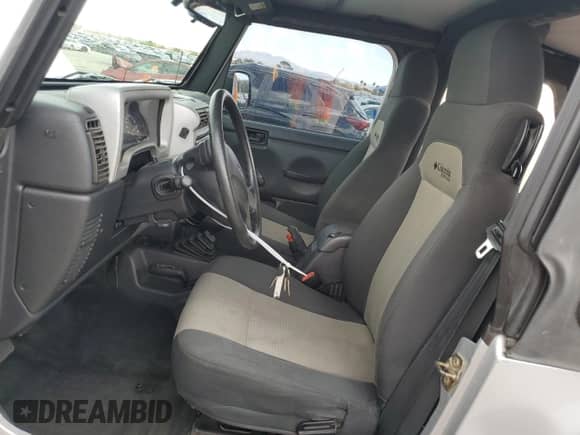 2004 Jeep Wrangler X z VIN 1J4FA39S04P739230, wystawiony jako Copart lot #84052405 z przebiegiem 97 855 mil mil oraz Szkoda całkowita • Salvage title. Historia ofert i sprzedaży dostępna na DreamBid. Obrazek 7.