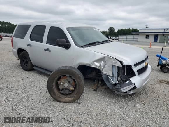 2014 Chevrolet Tahoe Commercial z VIN 1GNLC2E03ER128350, wystawiony jako Copart lot #68876045 z przebiegiem 199 729 mil mil oraz Szkoda całkowita • Salvage title. Historia ofert i sprzedaży dostępna na DreamBid. Obrazek 4.