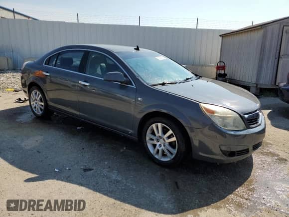 2009 Saturn Aura XR with VIN 1G8ZV57B59F215908, listed as a Copart auction lot 65055925 with 194,318 mi miles and Salvage title. Bid and sale history available at DreamBid. Image 4.