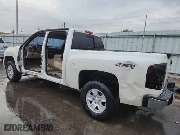 2013 Chevrolet Silverado 1500 LTZ with VIN 3GCPKTE72DG131724, listed as a Copart auction lot 82139705 with 183,083 mi miles and Salvage title. Bid and sale history available at DreamBid. Image 2.