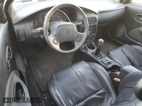 2002 Saturn SC with VIN 1G8ZR12722Z165666, listed as a Copart auction lot 82907074 with 70,051 mi miles and Salvage title. Bid and sale history available at DreamBid. Image 8.