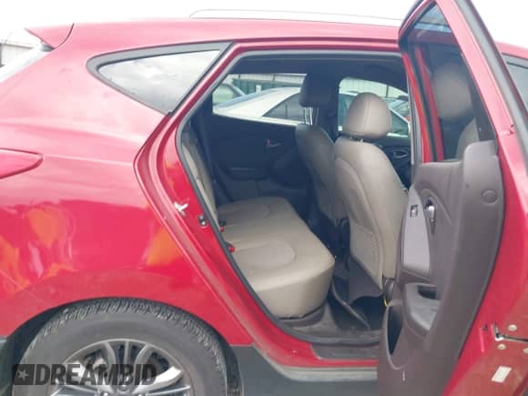 2015 Hyundai Tucson SE with VIN KM8JU3AG9FU115473, listed as a IAAI auction lot 43252750 with 56,571 mi miles and . Bid and sale history available at DreamBid. Image 8.