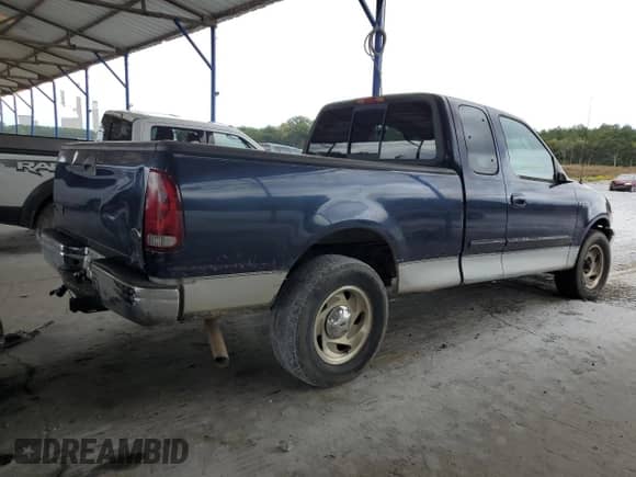 2003 Ford F-150 XL with VIN 2FTRX17203CA61104, listed as a Copart auction lot 83854135 with Not provided miles and Salvage title. Bid and sale history available at DreamBid. Image 3.