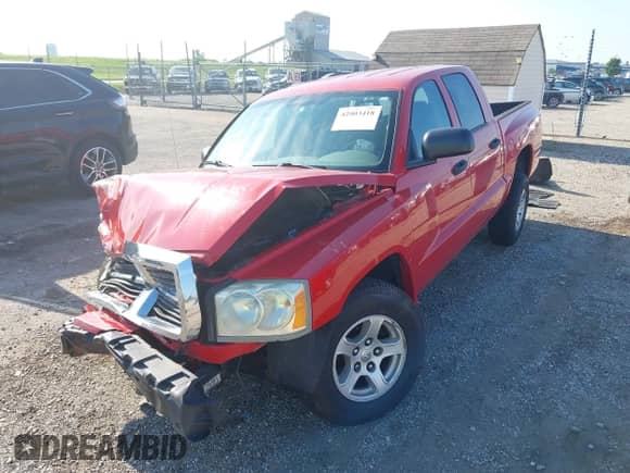 2006 Dodge Dakota SLT with VIN 1D7HE48KX6S517780, listed as a IAAI auction lot 42903418 with 218,769 mi miles and . Bid and sale history available at DreamBid. Image 17.
