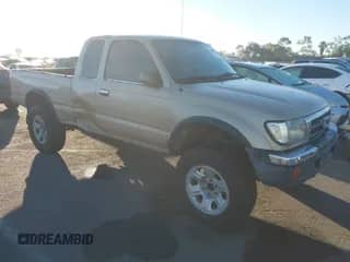 1999 Toyota Tacoma PreRunner z VIN 4TASN92N3XZ506527, wystawiony jako IAAI lot #43565232 z przebiegiem 308 724 mil mil oraz . Historia ofert i sprzedaży dostępna na DreamBid. Obrazek 1.