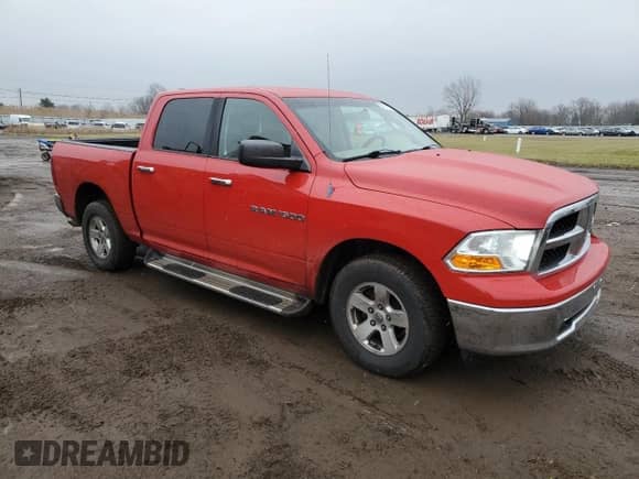 2011 Ram 1500 ST with VIN 1D7RV1CP9BS631110, listed as a Copart auction lot 84974714 with 133,510 mi miles and Salvage title. Bid and sale history available at DreamBid. Image 4.