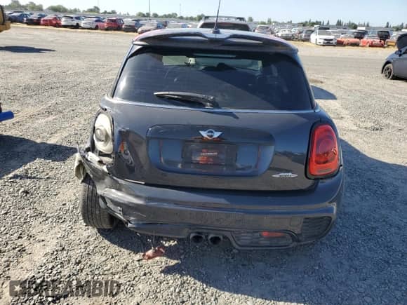 2016 MINI Hardtop John Cooper Works with VIN WMWXM9C53GT997497, listed as a Copart auction lot 56387615 with 59,852 mi miles and Salvage title. Bid and sale history available at DreamBid. Image 6.