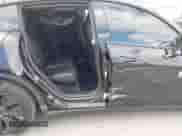 2024 Tesla Model Y with VIN 7SAYGDED8RF156984, listed as a IAAI auction lot 43324819 with 26,941 mi miles and . Bid and sale history available at DreamBid. Image 21.