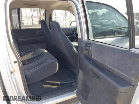 2004 Dodge Dakota Sport with VIN 1D7HG38K44S732251, listed as a IAAI auction lot 43536264 with 139,413 mi miles and . Bid and sale history available at DreamBid. Image 8.