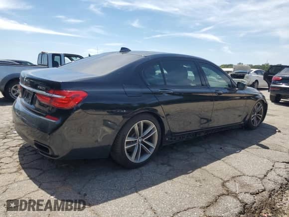 2016 BMW 7 Series 750i xDrive с VIN WBA7F2C58GG420362, выставлен на аукционе Copart как лот 69682485 с пробегом 79 928 миль миль и Списание • Salvage title. История ставок и продаж доступна на DreamBid. Изображение 3.