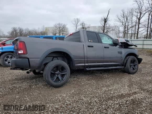 2021 Ram 1500 Warlock z VIN 1C6RR7GG1MS502509, wystawiony jako Copart lot #53110715 z przebiegiem Nie podano mil oraz Nie do naprawy • Non repairable. Historia ofert i sprzedaży dostępna na DreamBid. Obrazek 3.