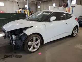 2013 Hyundai Veloster w/Gray Int z VIN KMHTC6AD1DU094831, wystawiony jako Copart lot #85944185 z przebiegiem 156 796 mil mil oraz Szkoda całkowita • Salvage title. Historia ofert i sprzedaży dostępna na DreamBid. Obrazek 1.