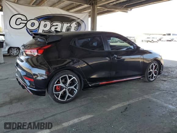 2020 Hyundai Veloster с VIN KMHT36AH7LU005264, выставлен на аукционе Copart как лот 64515745 с пробегом 63 302 миль миль и Списание • Salvage title. История ставок и продаж доступна на DreamBid. Изображение 3.