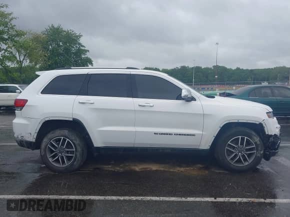 2022 Jeep Grand Cherokee Limited with VIN 1C4RJFBG3NC119698, listed as a IAAI auction lot 42306843 with 115,374 mi miles and . Bid and sale history available at DreamBid. Image 13.