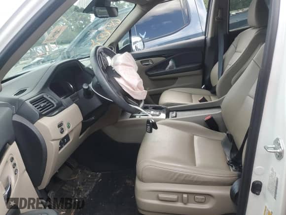 2021 Honda Pilot Touring 8-Passenger z VIN 5FNYF5H94MB042955, wystawiony jako Copart lot #62386735 z przebiegiem 58 976 mil mil oraz Szkoda całkowita • Salvage title. Historia ofert i sprzedaży dostępna na DreamBid. Obrazek 7.