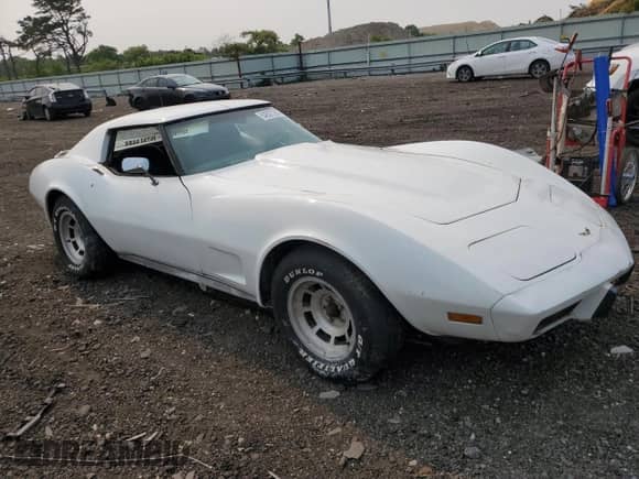 1977 Chevrolet Corvette with VIN 1Z37L7S405465, listed as a Copart auction lot 54827283 with Not provided miles and Salvage title. Bid and sale history available at DreamBid. Image 4.