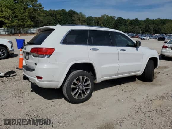 2017 Jeep Grand Cherokee Overland with VIN 1C4RJFCGXHC964499, listed as a Copart auction lot 71671795 with 117,302 mi miles and Salvage title. Bid and sale history available at DreamBid. Image 3.