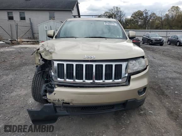 2012 Jeep Grand Cherokee Laredo z VIN 1C4RJFAG0CC156397, wystawiony jako Copart lot #87400775 z przebiegiem 165 192 mil mil oraz Szkoda całkowita • Salvage title. Historia ofert i sprzedaży dostępna na DreamBid. Obrazek 5.