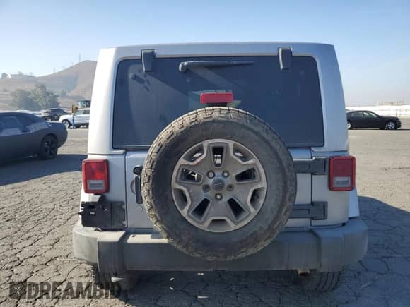 2014 Jeep Wrangler Rubicon with VIN 1C4BJWCG7EL206665, listed as a Copart auction lot 86903384 with 413,442 mi miles and Salvage title. Bid and sale history available at DreamBid. Image 6.