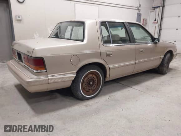 1991 Dodge Spirit with VIN 1B3XA46KXMF519542, listed as a IAAI auction lot 42278204 with 134,919 mi miles and . Bid and sale history available at DreamBid. Image 4.