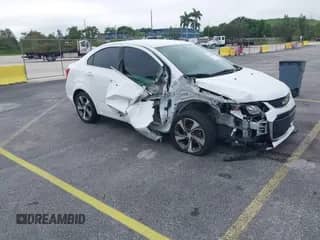 2018 Chevrolet Sonic Premier z VIN 1G1JF5SB3J4106945, wystawiony jako IAAI lot #43090914 z przebiegiem 116 456 mil mil oraz . Historia ofert i sprzedaży dostępna na DreamBid. Obrazek 1.