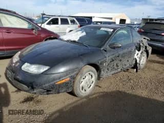 2002 Saturn SC with VIN 1G8ZY14702Z107166, listed as a Copart auction lot 87435474 with 178,319 mi miles and Salvage title. Bid and sale history available at DreamBid. Image 1.