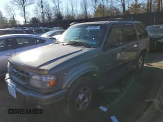 2000 Ford Explorer Limited with VIN 1FMDU75E0YZC63028, listed as a Copart auction lot 37947024 with 312,895 mi miles and Salvage title. Bid and sale history available at DreamBid. Image 1.