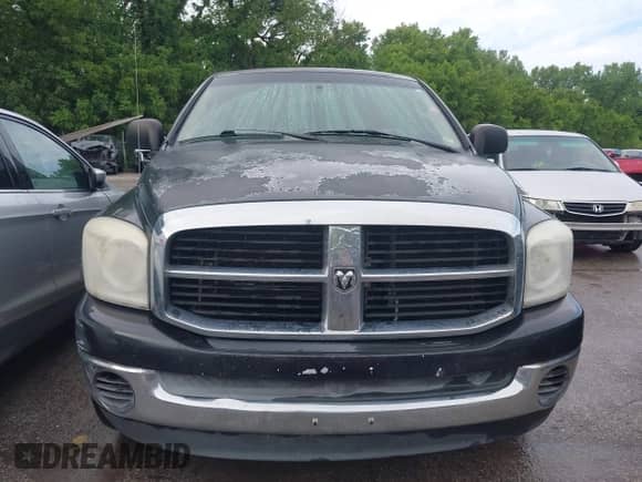 2007 Dodge 1500 SLT z VIN 1D7HU18P67S202084, wystawiony jako IAAI lot #42308989 z przebiegiem 227 266 mil mil oraz . Historia ofert i sprzedaży dostępna na DreamBid. Obrazek 12.