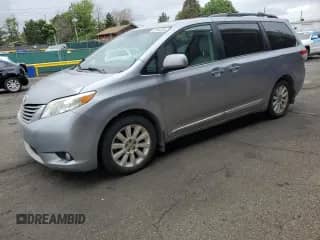2012 Toyota Sienna XLE with VIN 5TDDK3DC0CS045345, listed as a Copart auction lot 60988205 with 210,182 mi miles and Clean title. Bid and sale history available at DreamBid. Image 1.